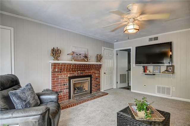 1052 Sunnyside Dr, Virginia Beach, VA 23464 - carpeted living room with a ceiling fan, crown molding, baseboards, and a brick fireplace