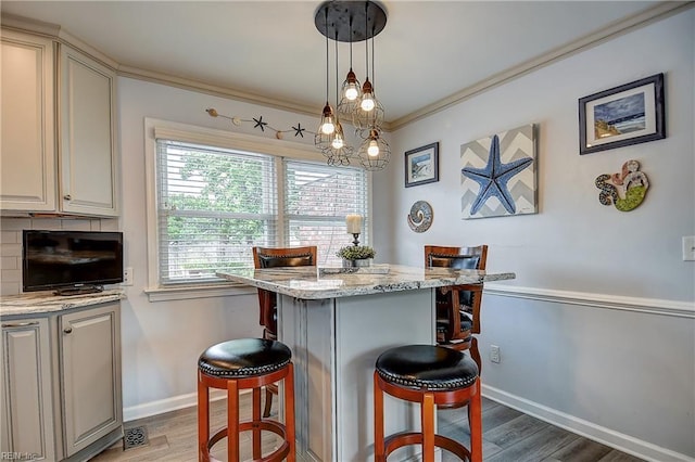 1052 Sunnyside Dr, Virginia Beach, VA 23464 - dining room with wood finished floors, baseboards, and crown molding