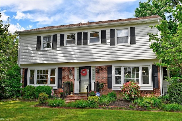 1052 Sunnyside Dr, Virginia Beach, VA 23464 - colonial inspired home featuring brick siding and a front lawn