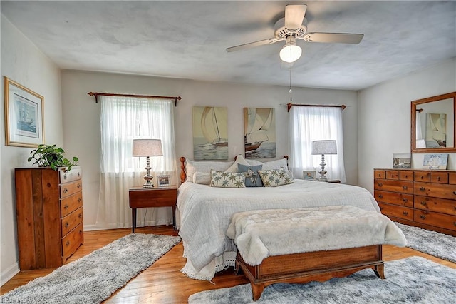 1052 Sunnyside Dr, Virginia Beach, VA 23464 - bedroom with wood finished floors, a ceiling fan, and baseboards