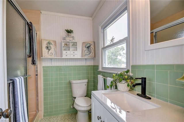 1052 Sunnyside Dr, Virginia Beach, VA 23464 - bathroom featuring a stall shower, vanity, toilet, tile walls, and crown molding