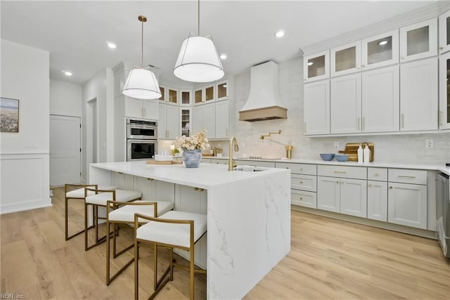 1653 Shipyard Rd, Chesapeake, VA 23323 - kitchen with custom range hood, decorative backsplash, light wood finished floors, double oven, and recessed lighting