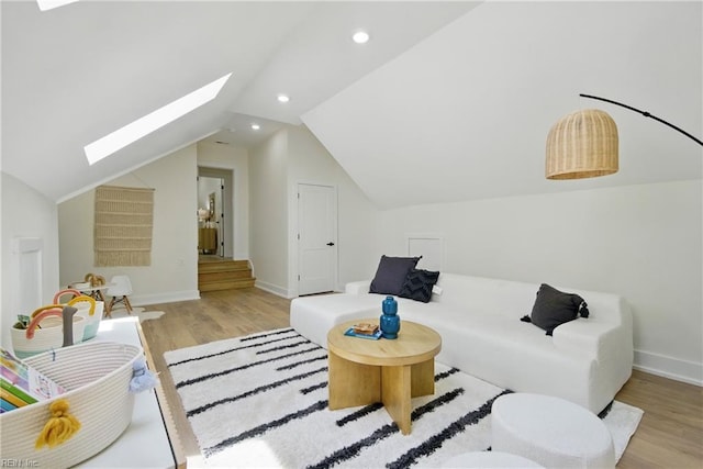 1653 Shipyard Rd, Chesapeake, VA 23323 - living area featuring a skylight, wood finished floors, lofted ceiling, baseboards, and recessed lighting