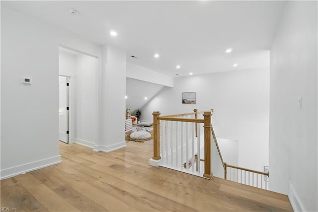 1653 Shipyard Rd, Chesapeake, VA 23323 - hallway with an upstairs landing, wood finished floors, recessed lighting, and baseboards