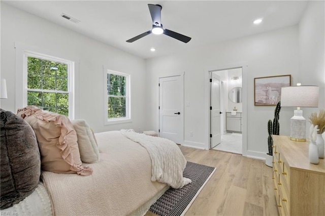 1653 Shipyard Rd, Chesapeake, VA 23323 - bedroom featuring light wood finished floors, ensuite bath, recessed lighting, baseboards, and ceiling fan