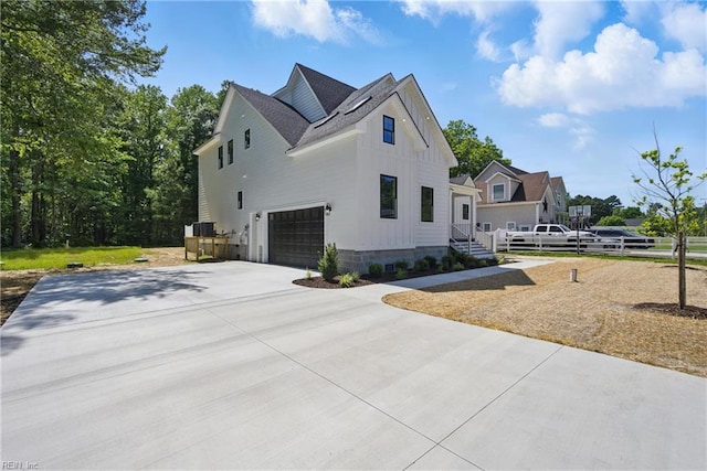 1653 Shipyard Rd, Chesapeake, VA 23323 - view of home's exterior featuring an attached garage and driveway