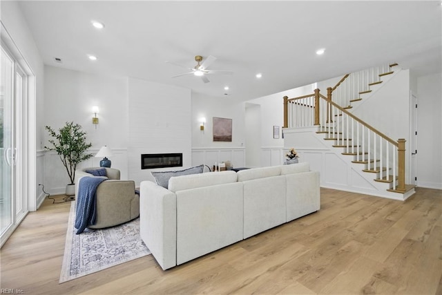 1653 Shipyard Rd, Chesapeake, VA 23323 - living area with a ceiling fan, a fireplace, stairs, light wood-style flooring, and recessed lighting