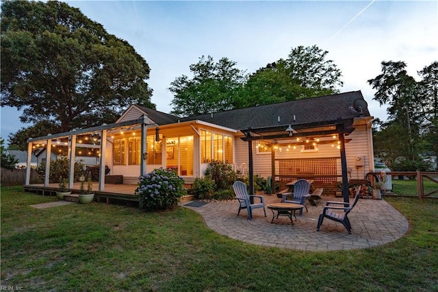 2305 Shorebird Ct, Chesapeake, VA 23323 - back of property with a deck, a patio area, and a fire pit