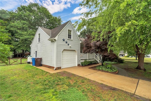 2305 Shorebird Ct, Chesapeake, VA 23323 - view of side of home featuring a yard, concrete driveway, an attached garage, and roof with shingles