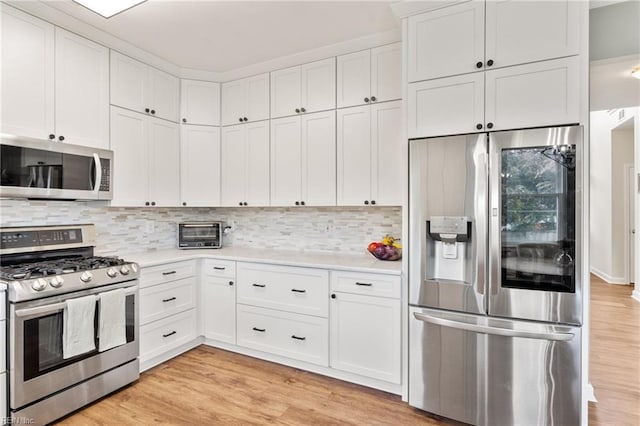 433 Fall Ridge Ln, Chesapeake, VA 23322 - kitchen featuring stainless steel appliances, light countertops, white cabinetry, and tasteful backsplash