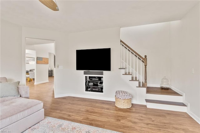 433 Fall Ridge Ln, Chesapeake, VA 23322 - living area featuring wood finished floors, stairs, and baseboards