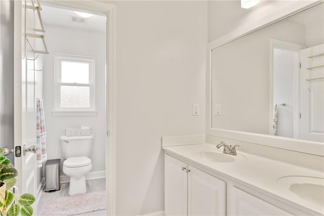 433 Fall Ridge Ln, Chesapeake, VA 23322 - full bath with double vanity, toilet, and baseboards