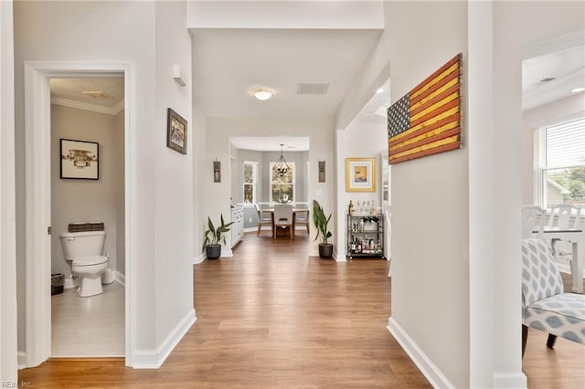 433 Fall Ridge Ln, Chesapeake, VA 23322 - corridor with light wood-type flooring, baseboards, and crown molding