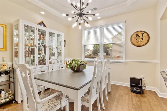 433 Fall Ridge Ln, Chesapeake, VA 23322 - dining space with a chandelier, light wood finished floors, baseboards, a tray ceiling, and recessed lighting