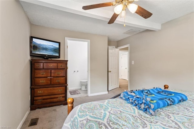203 Old Seaford Rd, Seaford, VA 23696 - carpeted bedroom with baseboards, ensuite bathroom, beam ceiling, and a ceiling fan