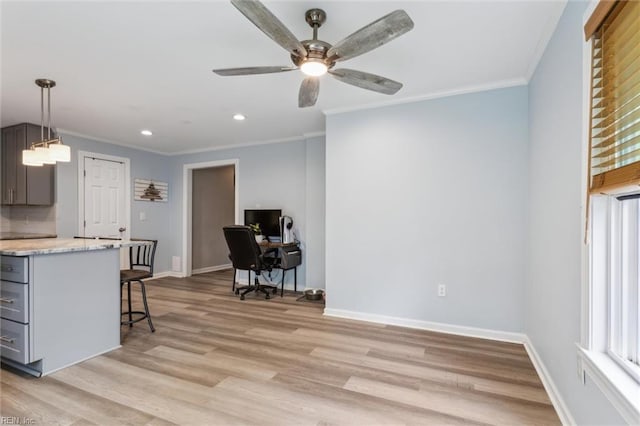 203 Old Seaford Rd, Seaford, VA 23696 - kitchen with gray cabinetry, a kitchen bar, crown molding, light wood-style flooring, and ceiling fan