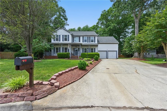 3234 Bentham Ln, Chesapeake, VA 23321 - traditional home with a porch, concrete driveway, and an attached garage