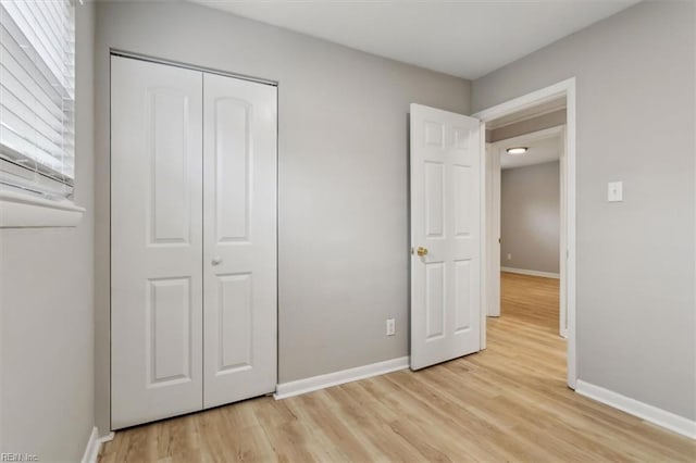 500 Mango Dr, Virginia Beach, VA 23452 - unfurnished bedroom featuring light wood-style floors, baseboards, and a closet