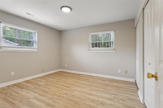 500 Mango Dr, Virginia Beach, VA 23452 - unfurnished bedroom featuring a closet, light wood-style flooring, and baseboards