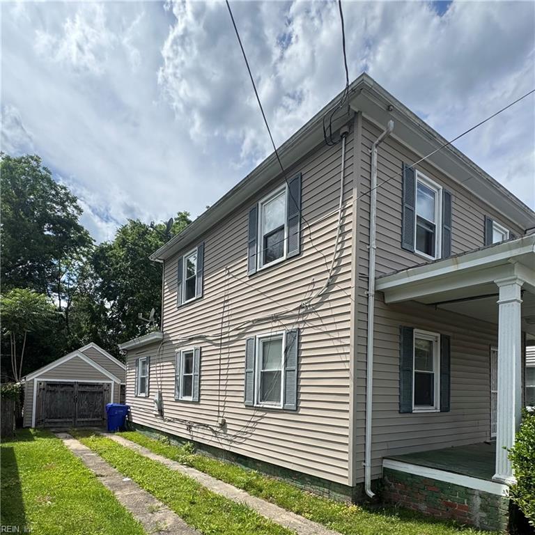 207 Saint James Ave, Suffolk, VA 23434 - view of side of property featuring an outbuilding and a yard