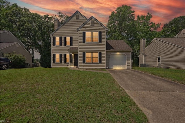 1518 River Creek Cres, Suffolk, VA 23434 - view of front of property featuring an attached garage, a front yard, concrete driveway, and a chimney