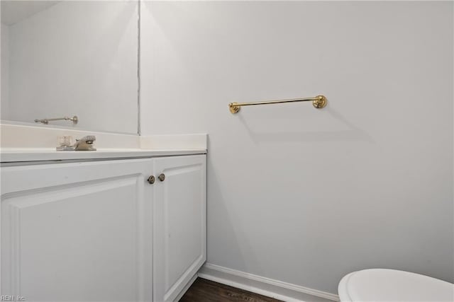 1518 River Creek Cres, Suffolk, VA 23434 - half bath with baseboards, vanity, toilet, and wood finished floors