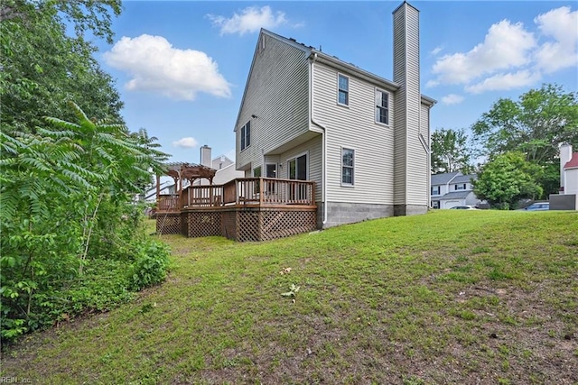 1518 River Creek Cres, Suffolk, VA 23434 - rear view of house featuring a wooden deck, a chimney, a lawn, and a pergola