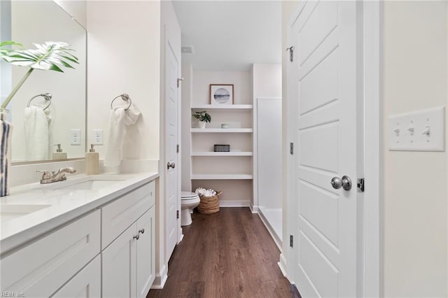 706 Fishermans Rd, Norfolk, VA 23503 - full bathroom featuring double vanity, toilet, and wood finished floors
