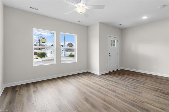 706 Fishermans Rd, Norfolk, VA 23503 - spare room featuring baseboards, wood finished floors, a ceiling fan, a smoke detector, and recessed lighting