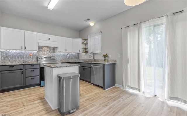 6329 Pelican Cres S, Suffolk, VA 23435 - kitchen with appliances with stainless steel finishes, open shelves, a sink, and gray cabinets