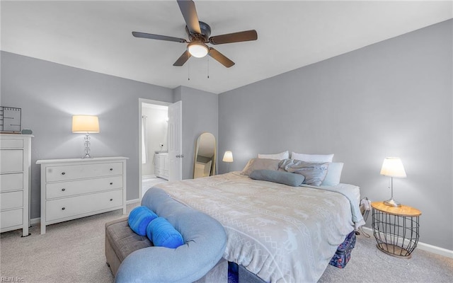 6329 Pelican Cres S, Suffolk, VA 23435 - bedroom featuring light carpet, baseboards, ensuite bath, and a ceiling fan