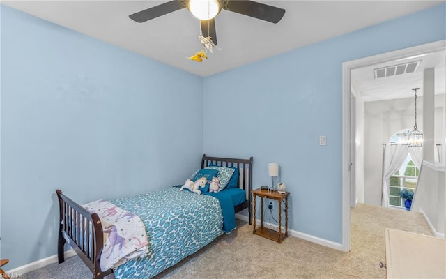 6329 Pelican Cres S, Suffolk, VA 23435 - carpeted bedroom featuring baseboards and a ceiling fan