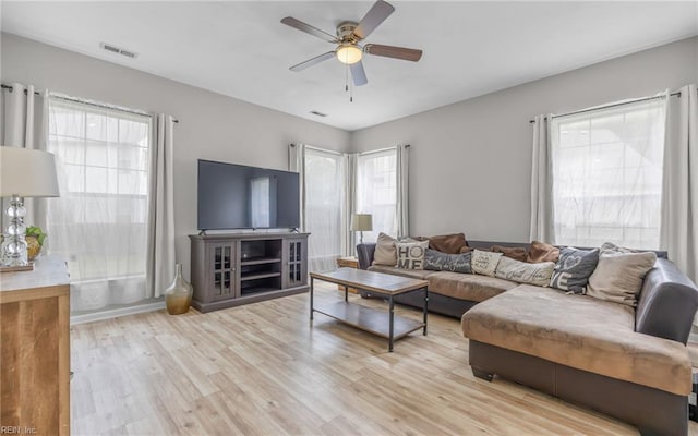 6329 Pelican Cres S, Suffolk, VA 23435 - living room with ceiling fan, plenty of natural light, and wood finished floors