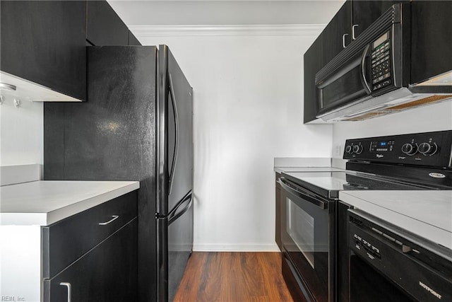 104 Camden Way Unit G, Yorktown, VA 23693 - kitchen with black appliances, dark cabinetry, baseboards, and dark wood-type flooring