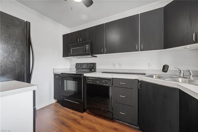 104 Camden Way Unit G, Yorktown, VA 23693 - kitchen featuring black appliances, dark cabinetry, light countertops, ceiling fan, and dark wood-style floors