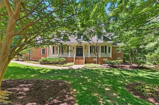 133 Mid Ocean, Williamsburg, VA 23188 - cape cod-style house featuring a porch, a front lawn, and brick siding