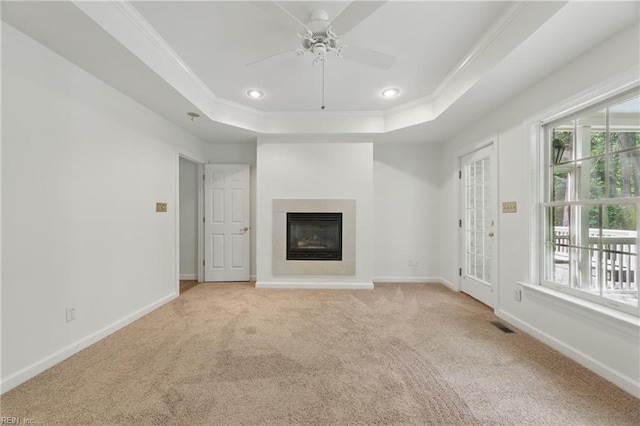 133 Mid Ocean, Williamsburg, VA 23188 - unfurnished living room featuring a raised ceiling, light colored carpet, a ceiling fan, baseboards, and ornamental molding