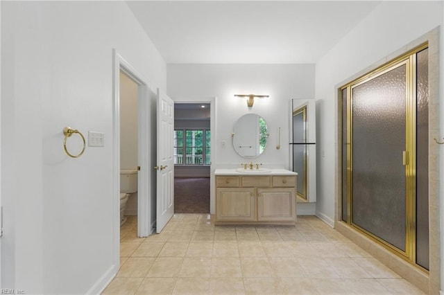 133 Mid Ocean, Williamsburg, VA 23188 - bathroom featuring vanity, toilet, tile patterned flooring, a shower stall, and baseboards