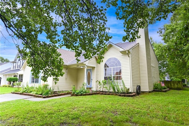 6100 Amberly Cir, Suffolk, VA 23435 - view of front of home featuring a chimney and a front yard