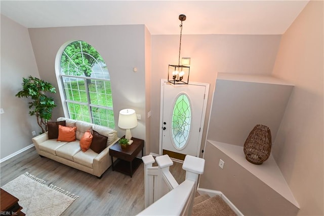 6100 Amberly Cir, Suffolk, VA 23435 - foyer featuring a chandelier, wood finished floors, and baseboards