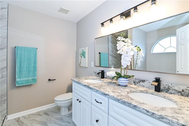 6100 Amberly Cir, Suffolk, VA 23435 - full bathroom with marble look tiles, double vanity, toilet, and baseboards