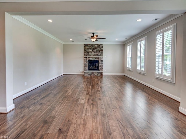88 Alexandria Way, Carrollton, VA 23314 - unfurnished living room featuring ceiling fan, ornamental molding, dark wood-style flooring, a stone fireplace, and baseboards