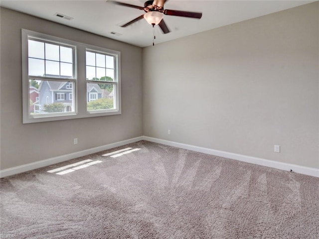 88 Alexandria Way, Carrollton, VA 23314 - carpeted empty room with baseboards and a ceiling fan