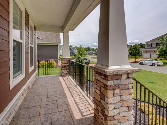 88 Alexandria Way, Carrollton, VA 23314 - covered porch with a residential view