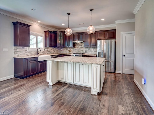 88 Alexandria Way, Carrollton, VA 23314 - kitchen featuring stainless steel fridge with ice dispenser, a sink, backsplash, a center island, and ornamental molding