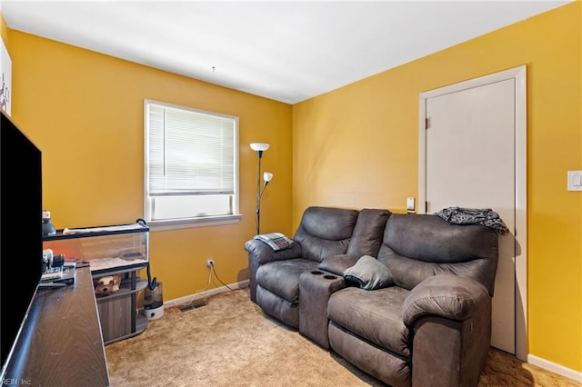603 Page Dr, Hampton, VA 23669 - living room with carpet and baseboards