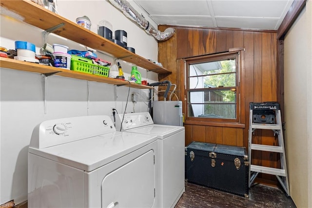 603 Page Dr, Hampton, VA 23669 - washroom featuring water heater, washer and dryer, and wooden walls