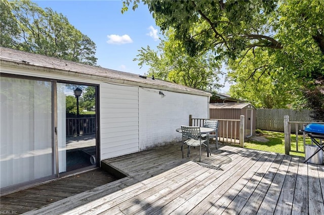 603 Page Dr, Hampton, VA 23669 - wooden deck with a fenced backyard, area for grilling, and outdoor dining space