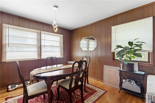 603 Page Dr, Hampton, VA 23669 - dining space with light wood-type flooring and wood walls