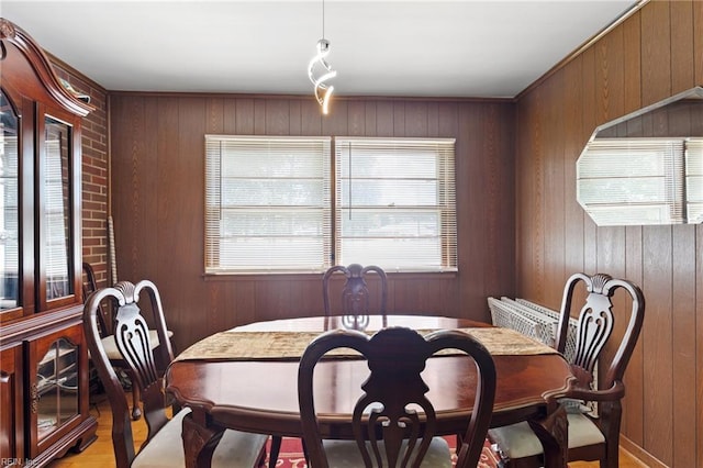 603 Page Dr, Hampton, VA 23669 - dining space with plenty of natural light and wood walls